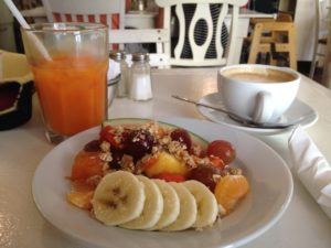 Fresh fruit, juice and coffee in Puerto Rico with granola
